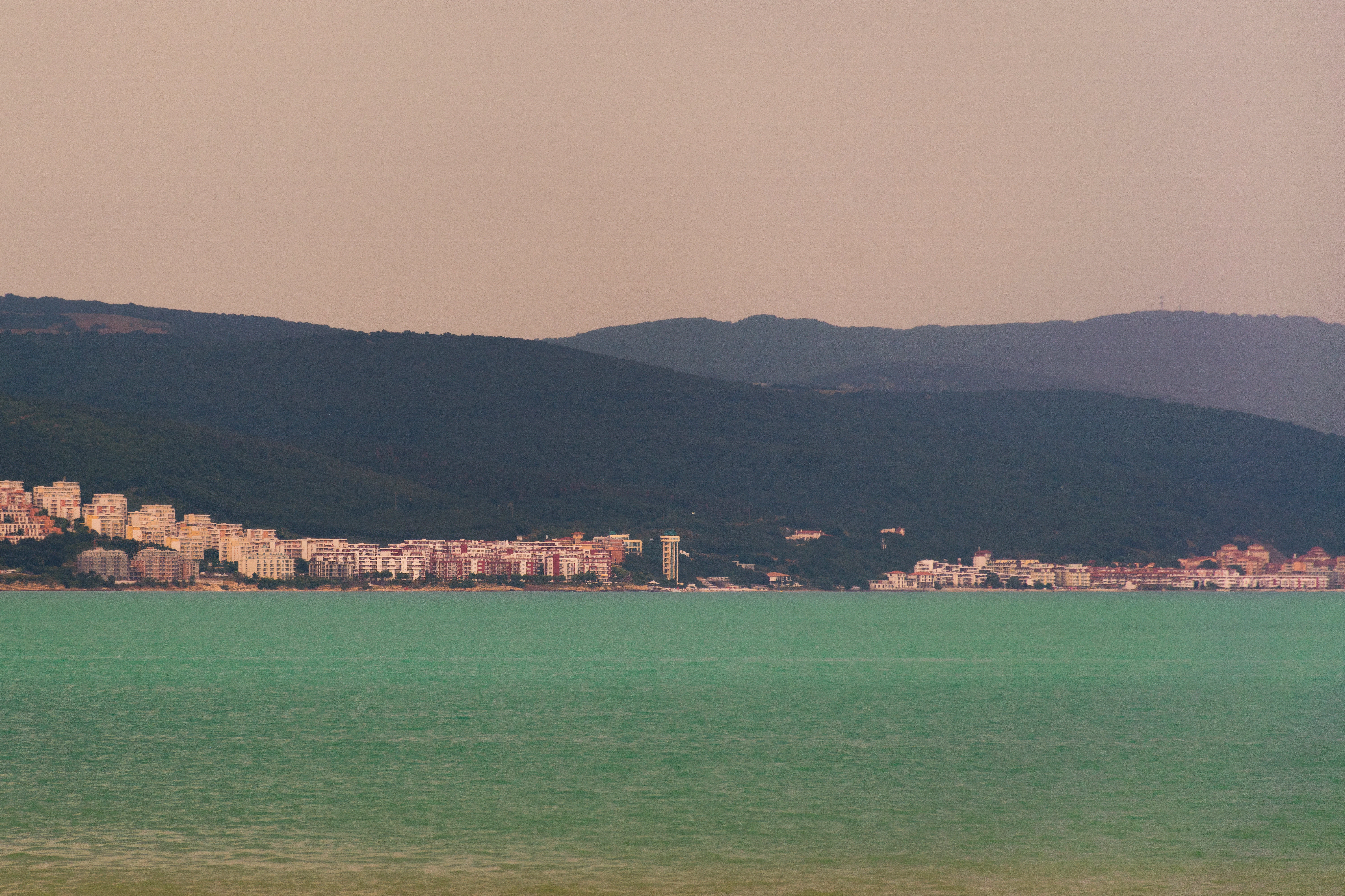 a city next to a body of water
