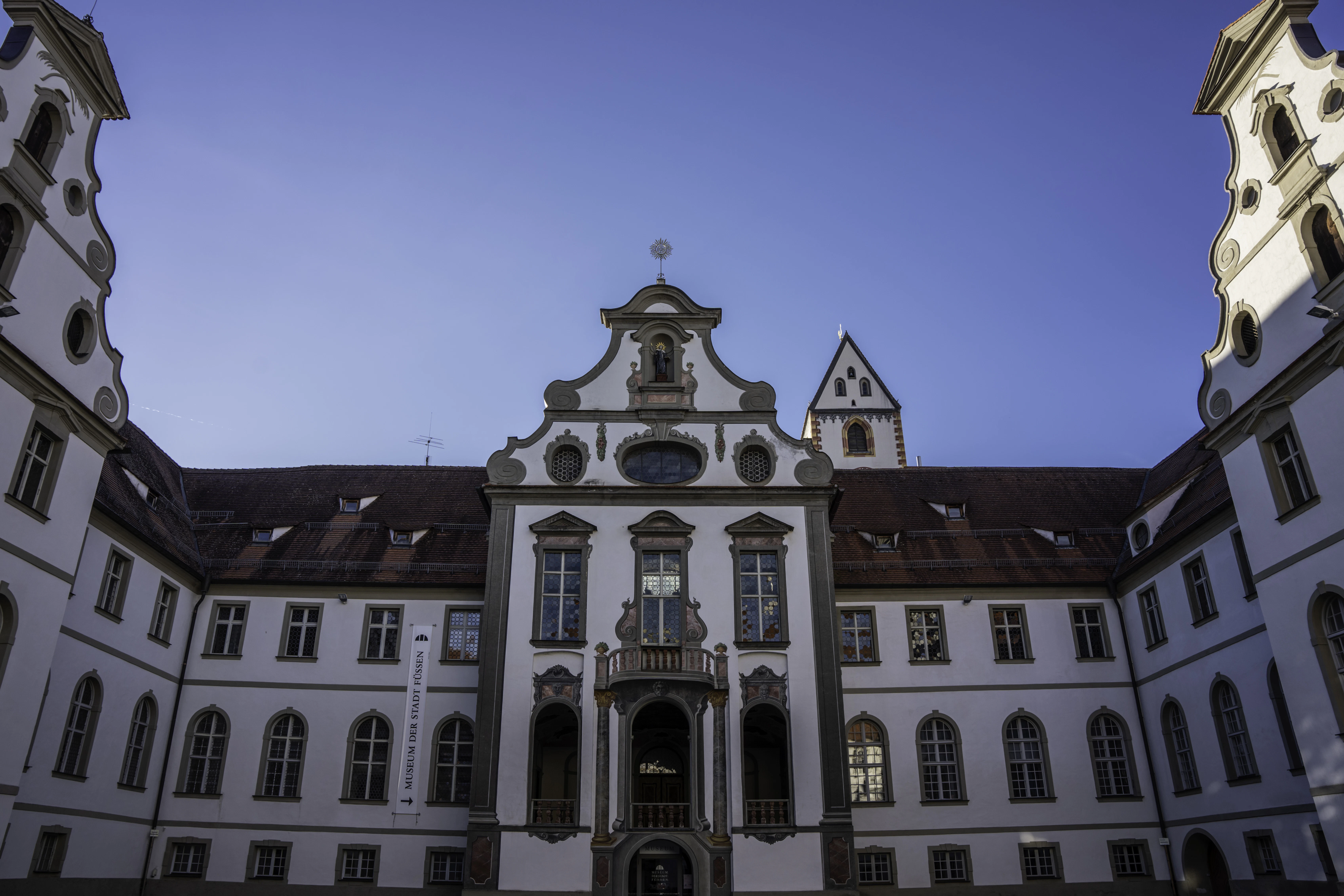 A large building with a clock on the front of it