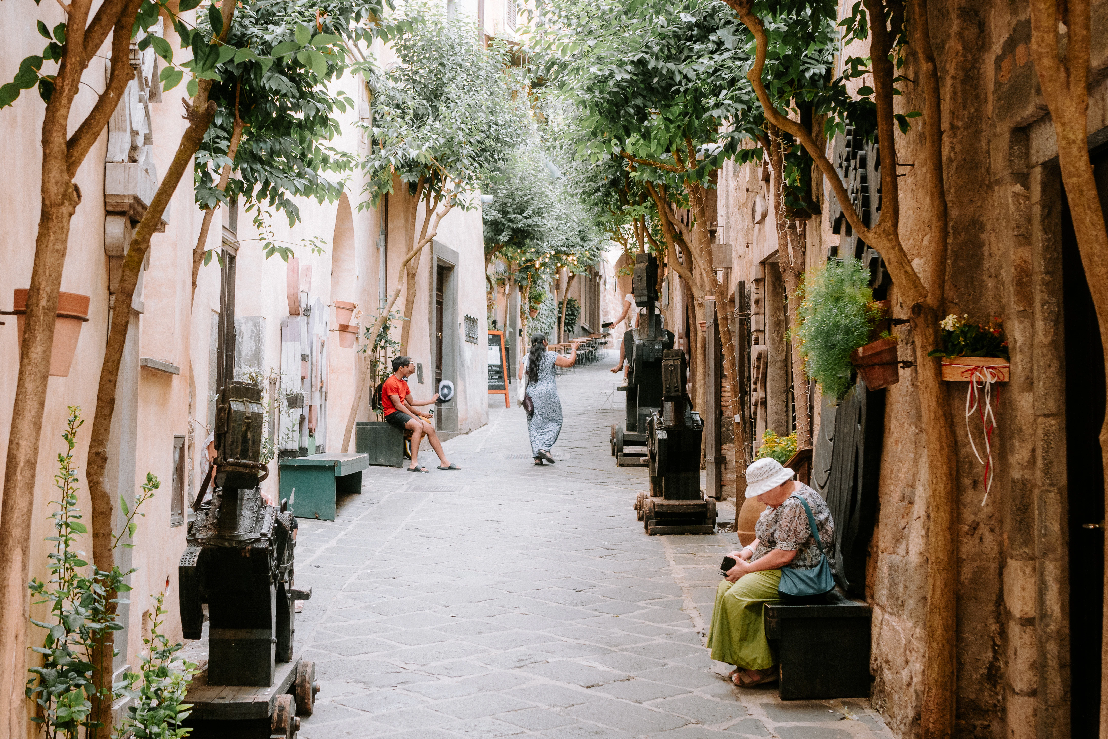 People relaxing on a charming european street