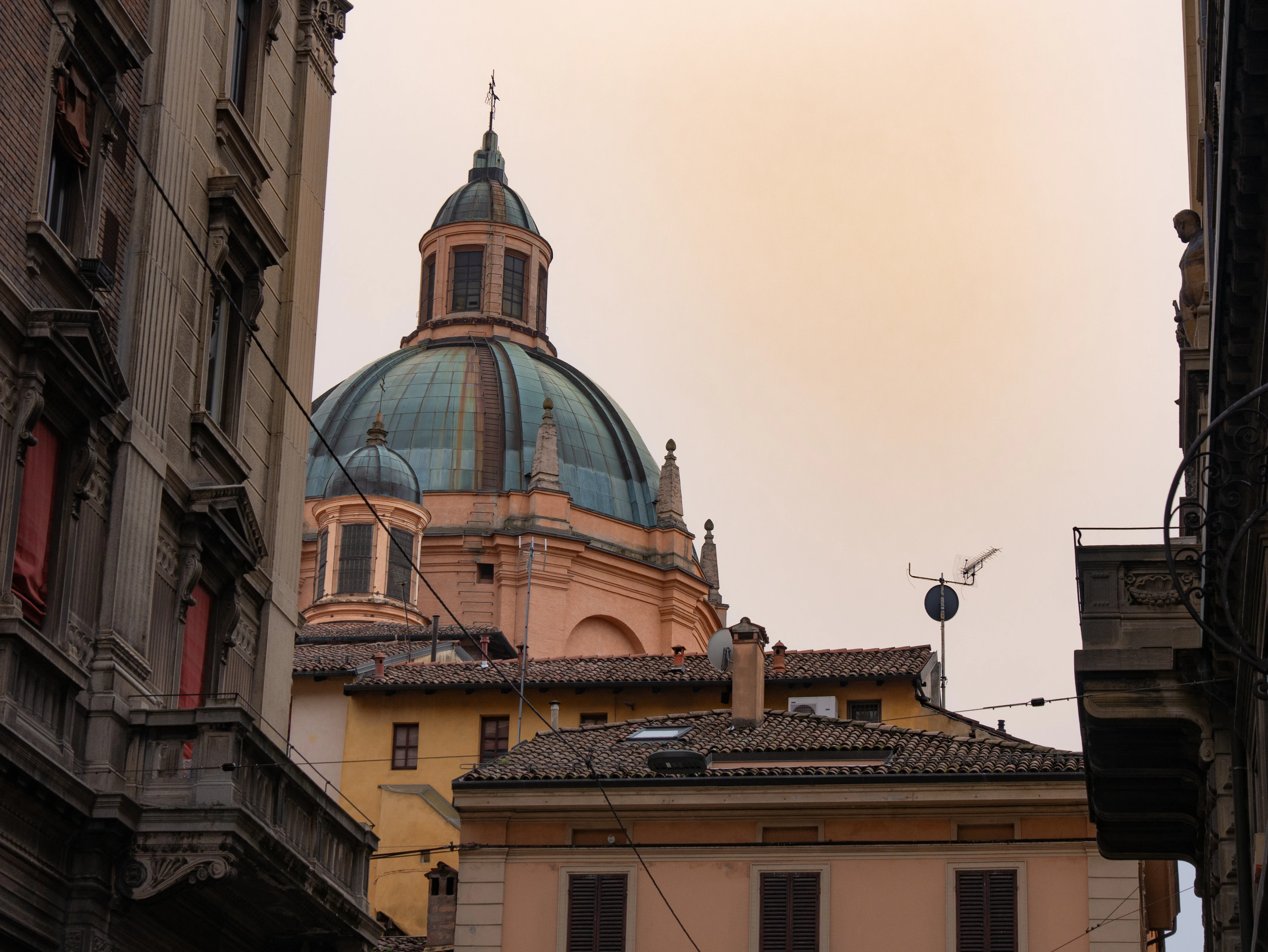 A tall building with a dome on top of it