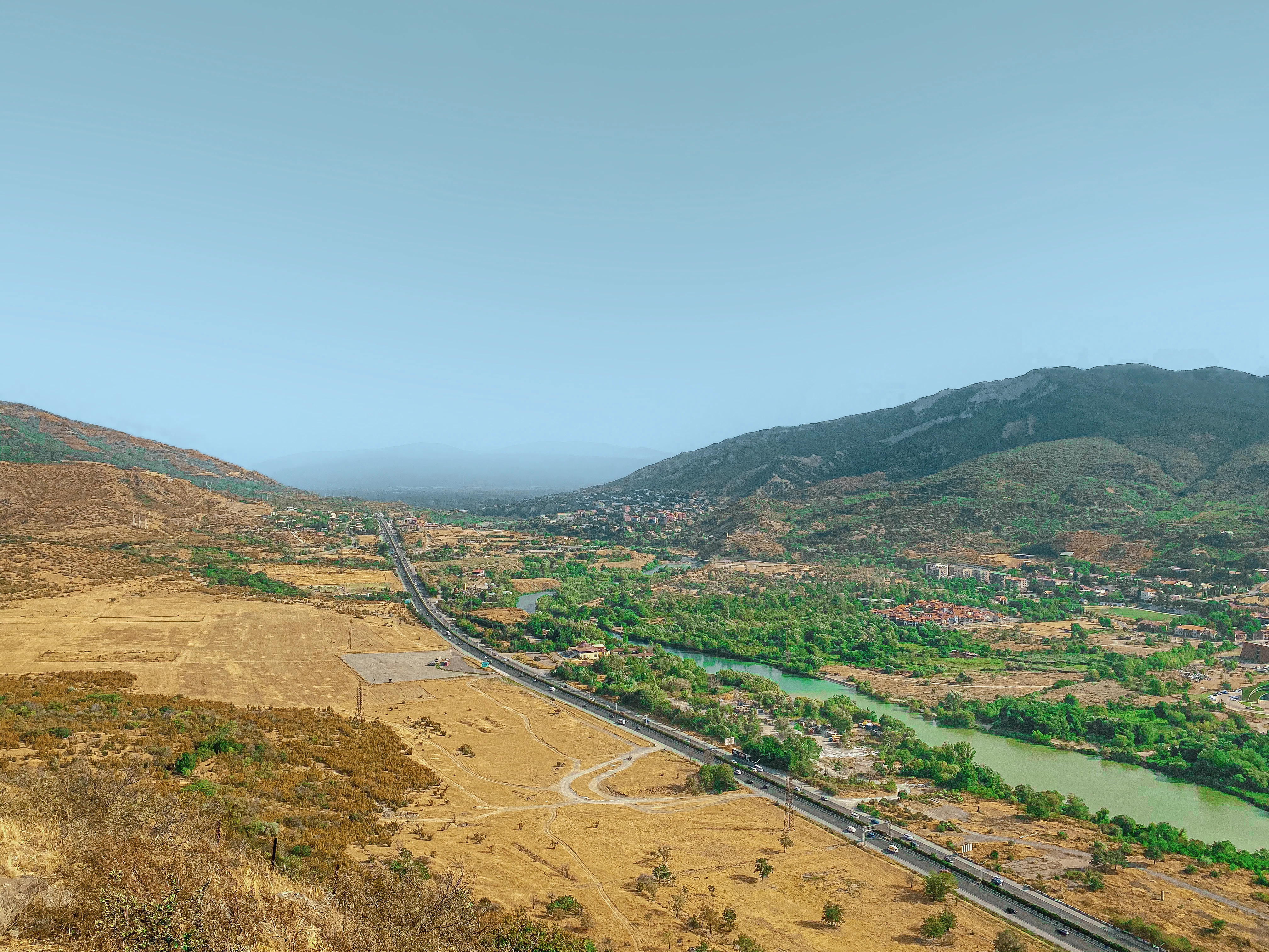 a road going through a valley