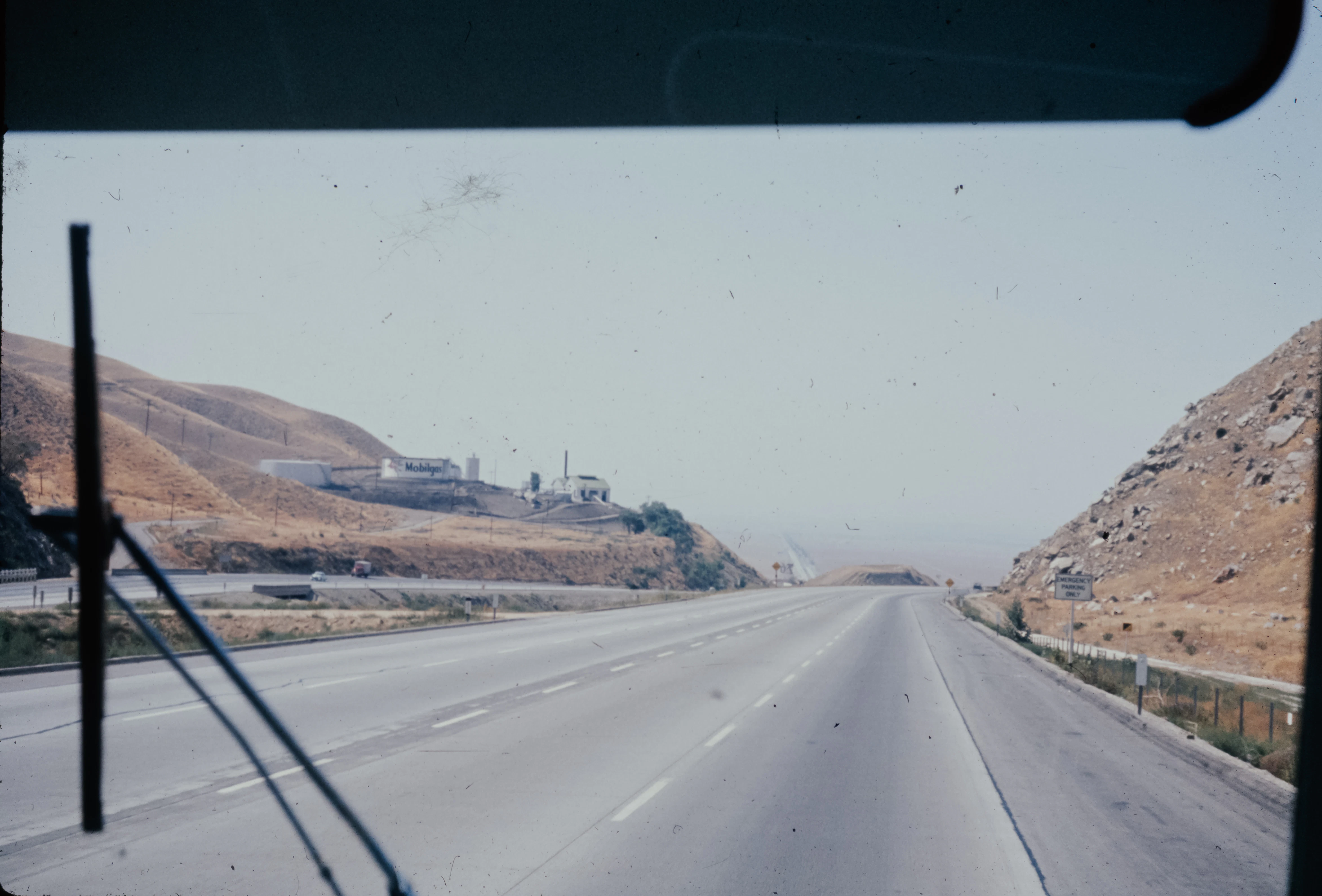 a view of a highway from inside a vehicle