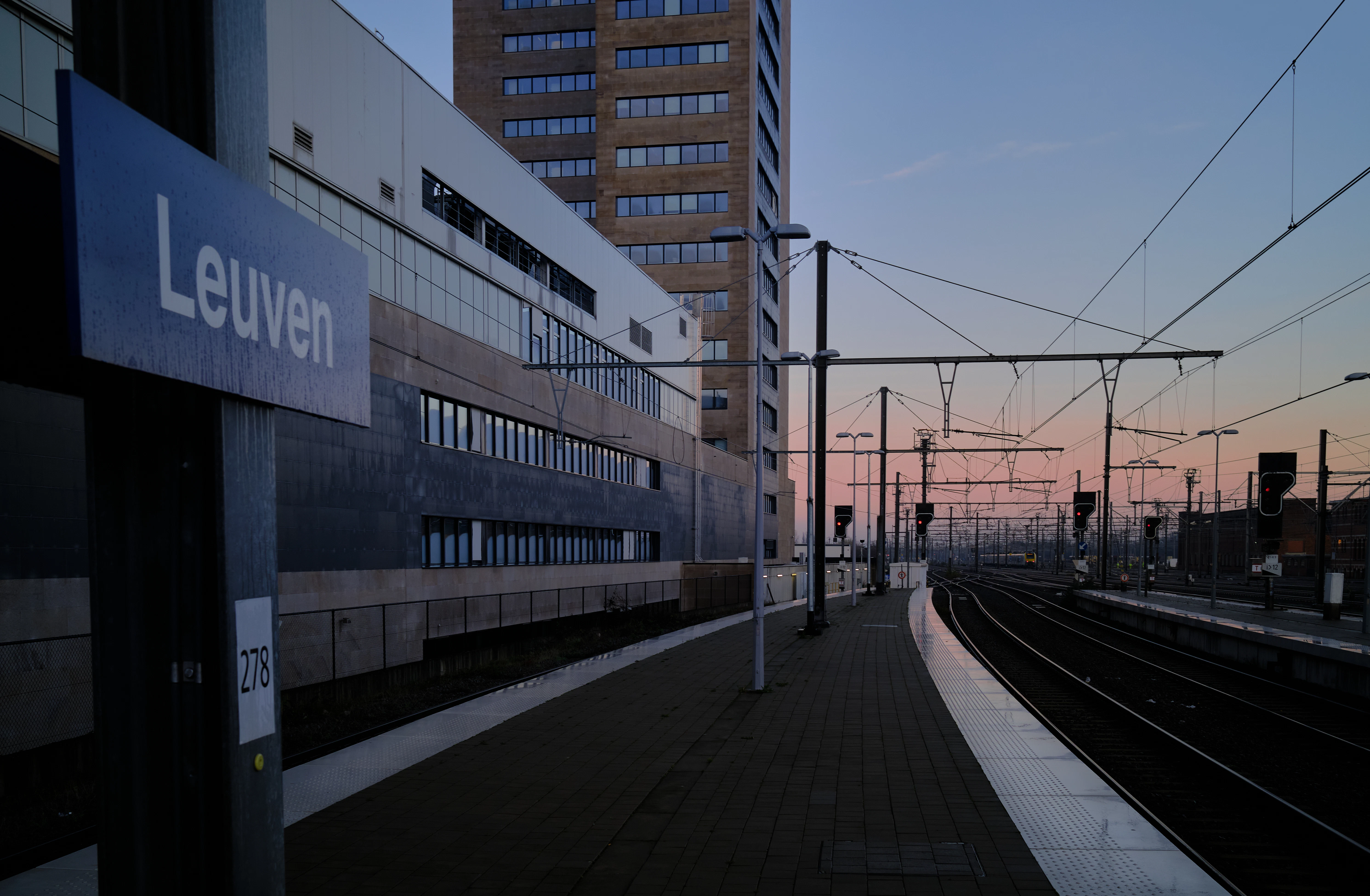 white train on train station during daytime