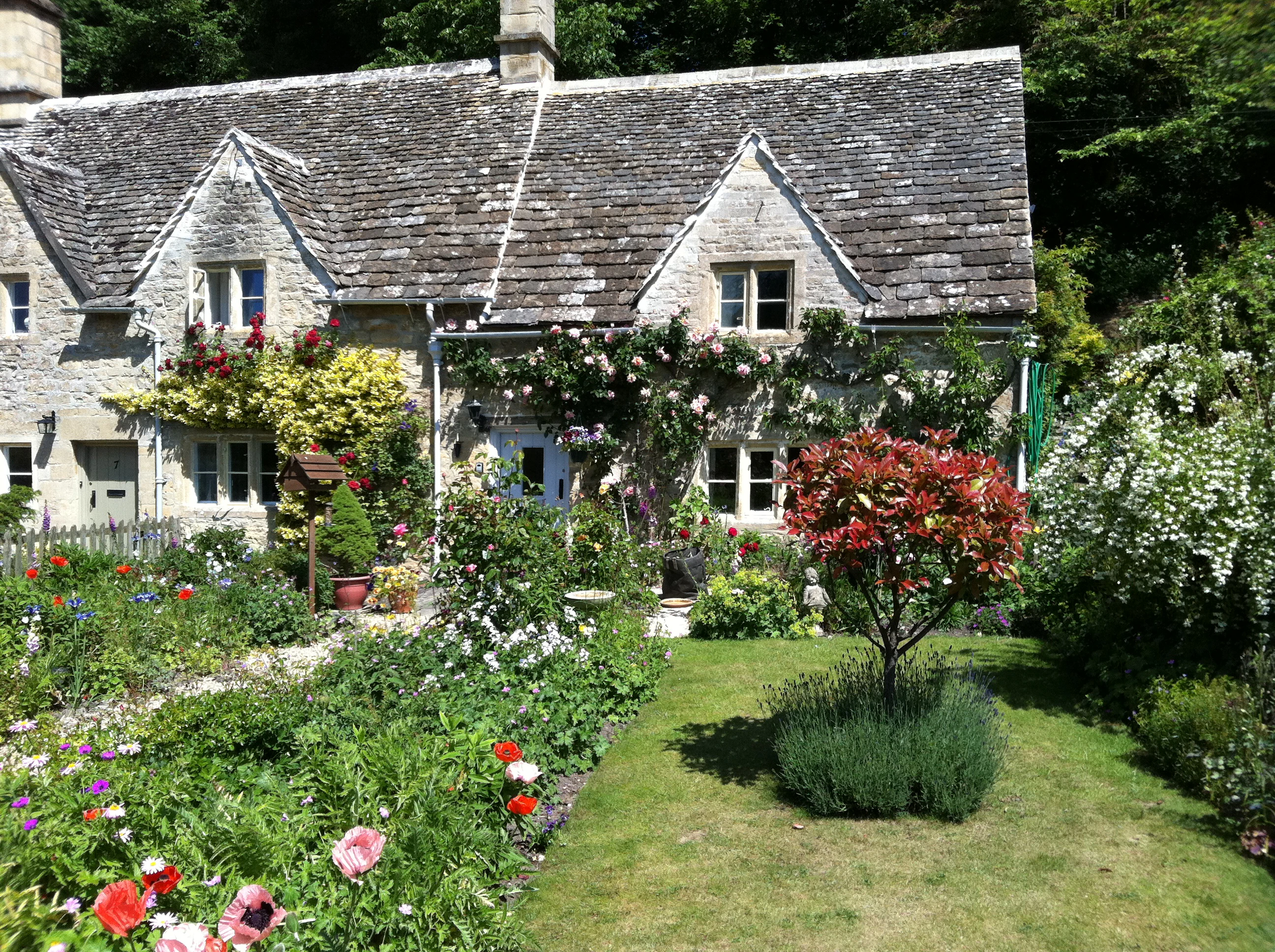 a house with a garden in front of it