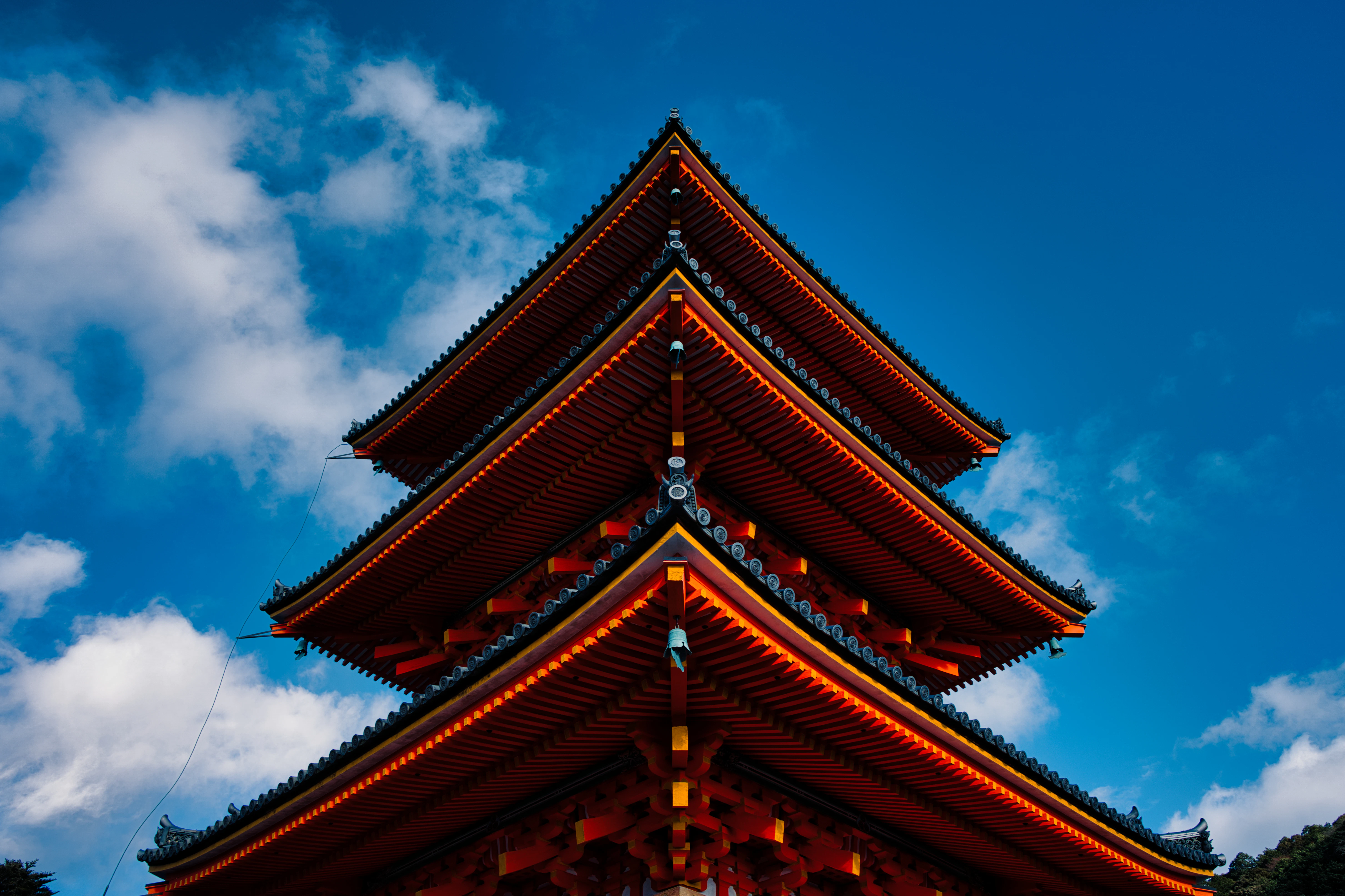 a tall building with a sky background