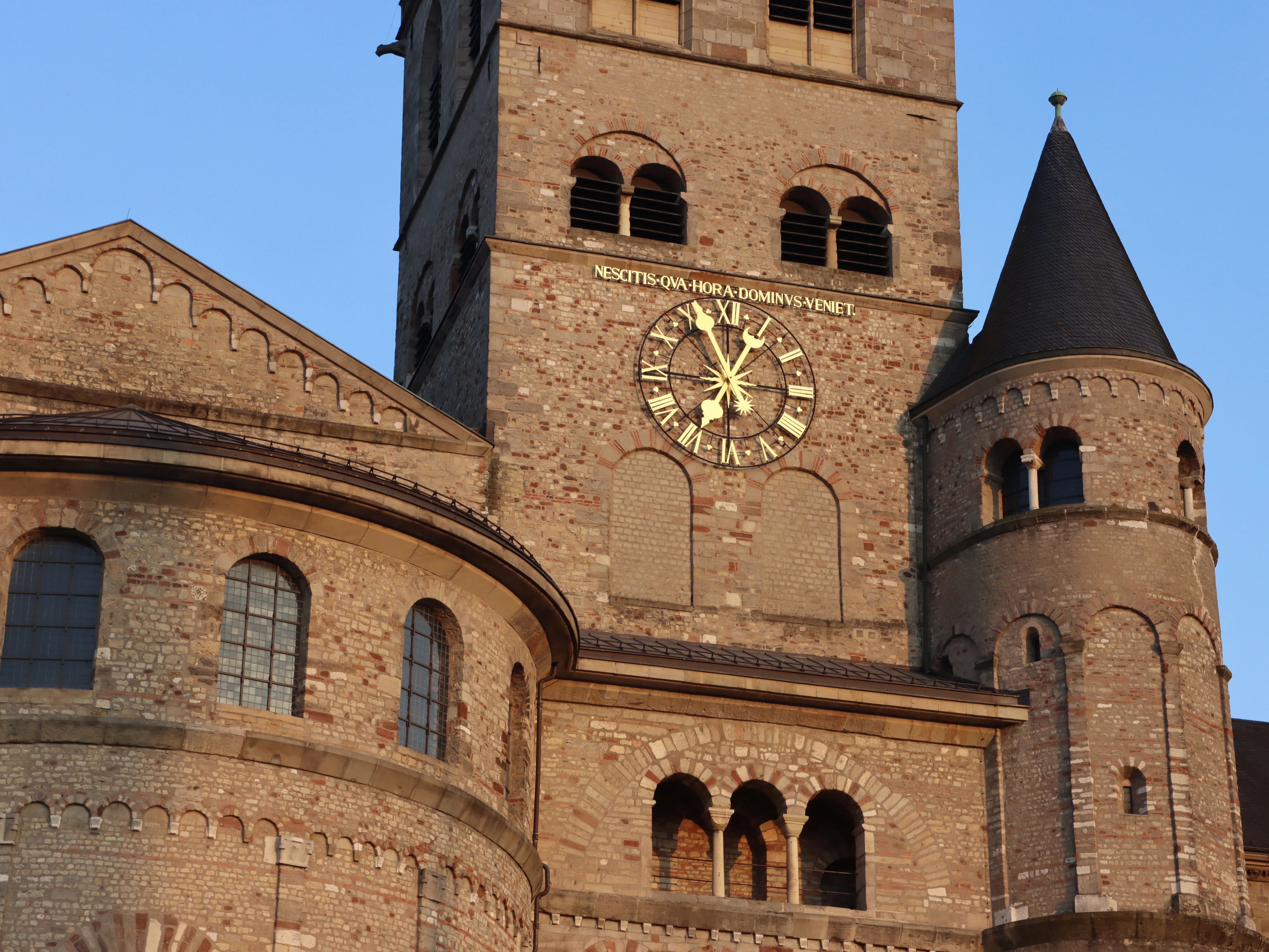 A large building with a clock on the side of it