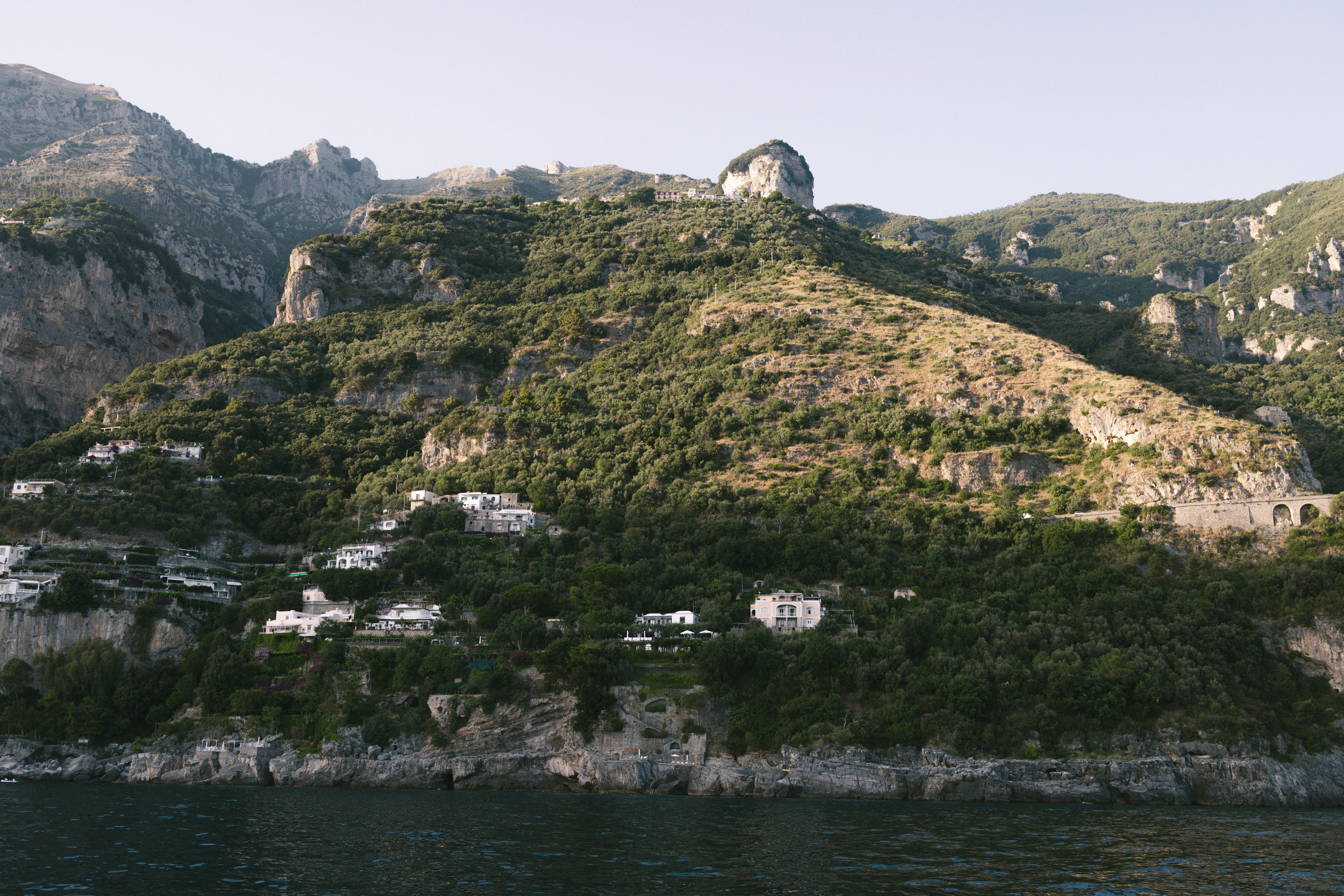 A mountain with a village on top of it